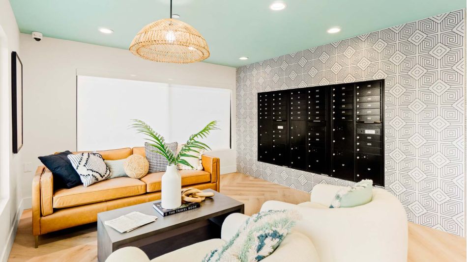 The Flats lobby area with seating and mailboxes