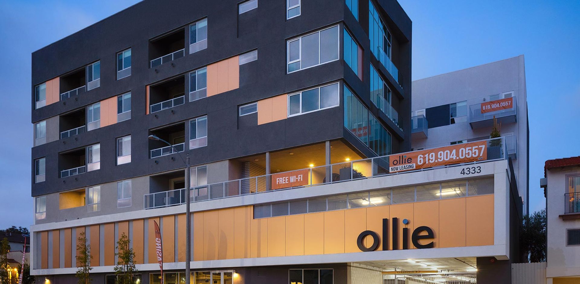 evening exterior of Ollie North Park Loft apartments